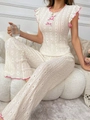 Beige kanten pyjamaset met roze golvende randen en schattige details met strikjes - S / Rozerood Rand