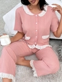 Pyjama rose deux pièces avec haut à manches courtes et finitions en dentelle blanche - S / Rose