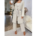 Detailed view of cream-white three-piece pajama set with contrast black stitching and texture - S / Cardigan-Cami-Pants / Beige Black Trim