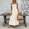 Zomerse crèmekleurige midi-jurk met gesmokt lijfje en knopen voor een vakantie-look - S / Abrikoos