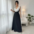 Elegante mouwloze maxi-avondjurk met diepe V-hals in zwart-wit contrastkleur design - S / Zwart