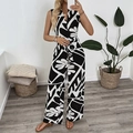 Tuta da donna con scollo a V senza maniche gamba larga con stampa di foglie bianche e nere - S / Nero