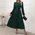 Detail of elegant dark green pleated dress with bishop sleeves and matching buckled belt - S / Dark Green