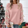 Detail eines rosa Sweatshirts mit weißen Satinschleifen an den langen Ärmeln - S / Rosa