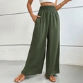 Women's high waist wide leg pants in dark green textured fabric with elastic waist - Green