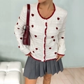 Elegant white knit cardigan with red heart patterns and contrasting crochet trim details - XS / White