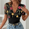 Zwarte dames bodysuit met V-hals, bloemenborduursel en een elegant mesh-inzetstuk ontwerp - S / Zwart