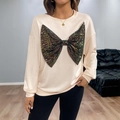 Beige oversized sweatshirt with a large black sequin bow and elegant drop shoulders - S / Apricot