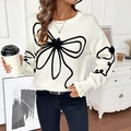 Pull en tricot blanc chic avec nœuds noirs 3D et coupe ample pour un style décontracté - S / Blanc