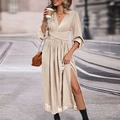 Detail view of champagne long-sleeve midi dress featuring V-neckline and high side slit - S / Apricot