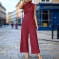 Detail view of the elegant deep wine red sleeveless jumpsuit with a high neck design - S / Burgundy