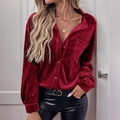 Detail of burgundy velvet shirt featuring lapel collar and shimmering fabric texture - S / Red