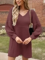 Close-up of the V-neck detail and waffle knit texture on a dark red sweater dress - S / Brick Red