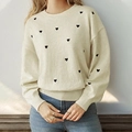 Women's cream knit sweater featuring black heart pattern with ribbed neck and cuffs - S / Beige