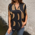 Dames blouse met V-hals en korte mouwen met abstracte print en casual zwart-khaki patchwork - S / Zwart