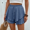 Women's blue high-waisted leisure shorts with textured fabric and layered design - Haze Blue