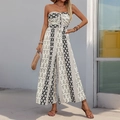 Detailansicht des Bohème-Prints und des Knotendetails am trägerlosen Jumpsuit mit weitem Bein - S / Schwarz