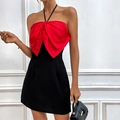 Damen Halterkleid mit großer roter Satinschleife und engem schwarzem Minirock - XS / Rot und Schwarz