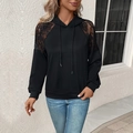 Women's black long sleeve drawstring hoodie featuring elegant floral lace patchwork sleeves - S / Black