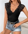 Slim fit black ribbed bodysuit featuring delicate lace V-neckline and trim details - S / Black