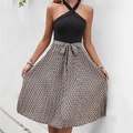 Elegant halter neck dress featuring a black ribbed top and pleated geometric print skirt - S / Khaki