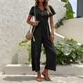 Women's summer black V-neck wide leg jumpsuit with button detail and high waist - S / Black