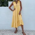 Elegant sleeveless V-neck maxi dress in yellow with button details and tiered skirt - S / Dresses / Goose Yellow