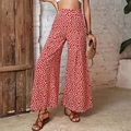 Wijd uitlopende broek met hoge taille in rode stof met witte bloemenpatronen - S / Rood