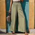 Pantaloni a gamba larga a vita alta da donna in verde chiaro a pois con punto smock - S / Verde