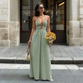 Elegant green and white striped halter maxi dress with a deep V-neck and open back design - S / Dark Green