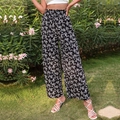 Pantaloni a zampa a vita alta da donna in stampa floreale bianca e nera elegante - S / Nero