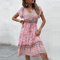 Roze bohemien zomerjurk met bloemenprint, V-hals, knopen en trekkoord in de taille - S / Roze