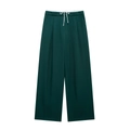 Detail einer dunkelgrünen Weitbein-Hose mit elastischem Bund und weißem Kordelzug - XS / Dunkelgrün