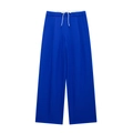 Detailansicht der blauen Weitbeinhose mit weißem Kontrastbund und Kordelzug-Design - XS / Blau