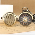 Vintage bronze hollow mechanical pocket watch with Roman numerals and visible gears - Manual Style 1 / Bronze