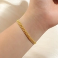 Three-strand 18k gold plated beaded bracelet featuring small polished metallic beads - 35【e2200】three-layer Beaded Bracelet Gold
