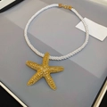 Vacation style gold starfish pendant necklace with chunky white rope chain design - Gold Starfish White Braided Rope Style (16#)