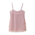 Detail of pink lace-trimmed camisole top showing the smooth satin fabric texture - Pink