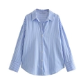 Detailed view of the blue and white vertical striped cotton shirt with a curved hemline - XS / Blue Striped