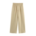 Detail der beigen weit geschnittenen Hose mit elastischem hohem Bund und atmungsaktivem Stoff - Hellbeige Hose