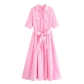 Detail of pink short-sleeve shirt dress featuring a classic collar and waist tie belt - XS / Pink