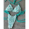 Mint green two-piece bikini featuring 3D floral rosettes and halter neck triangle top - Blue