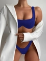 Detail of ribbed navy blue bikini set paired with a white blazer for a stylish look - S / Dark Blue