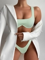 Close-up of mint green ribbed bikini set paired with an oversized white fashion blazer - S / Light Green