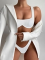 Detail of ribbed texture on white two-piece bikini set styled with a formal blazer - S / White