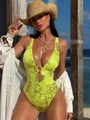 Detail of neon yellow glitter swimsuit with deep V-neck and decorative gold metal ring - S / Fluorescent Green