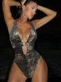Detail of metallic textured fabric with gold ring hardware on deep V-neck swimsuit - S / Gold Black