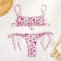 Detailed flat lay of a pink floral bikini set with rose prints and side-tie bottoms - S / Pink Rose Print