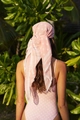 Detailed back view of a pink polka dot headscarf styled with a matching one-piece swimsuit - M / Pink Polka Dot Headscarf