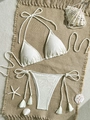 Flat lay of white crochet lace bikini with seashells and pearls on a straw background - S / Off-white
